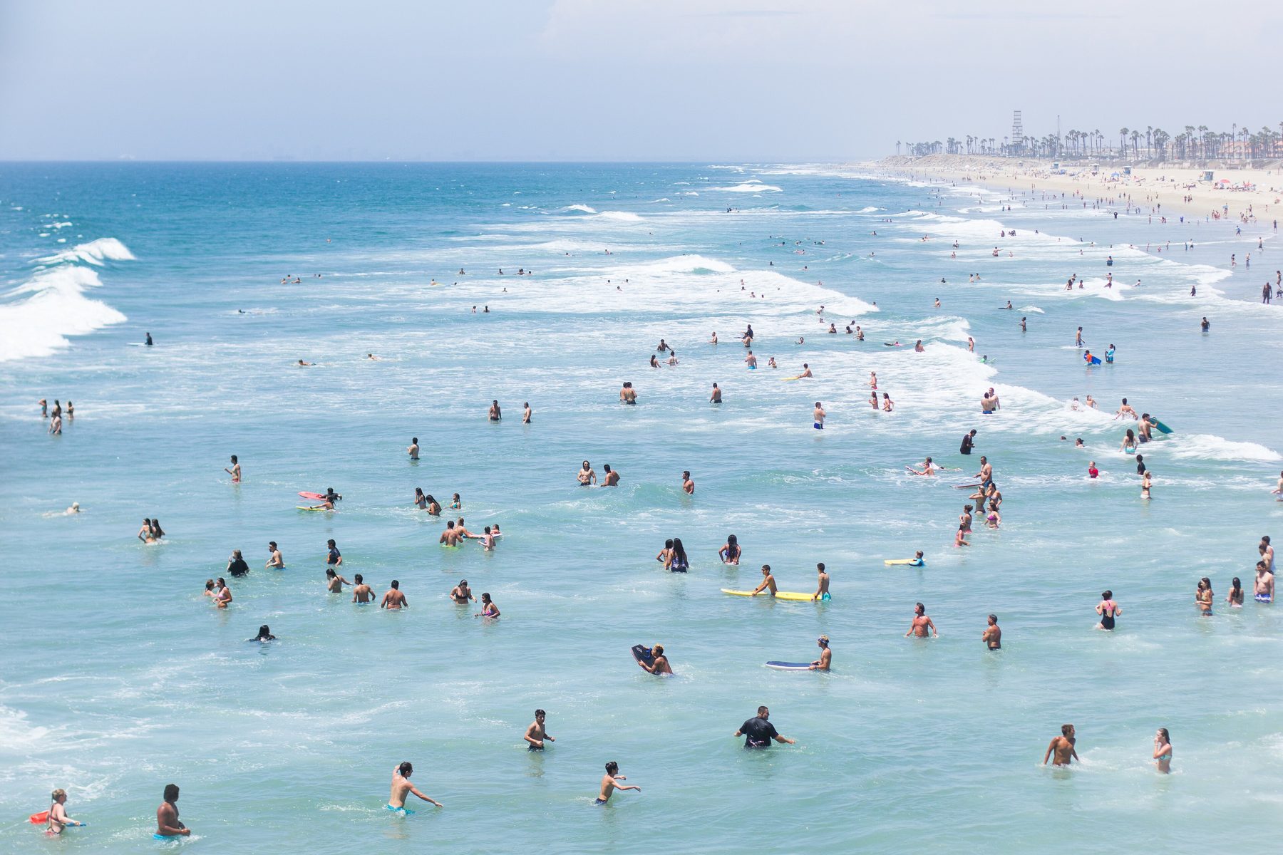 Huntington Beach shoreline and pier on a clear Southern California day